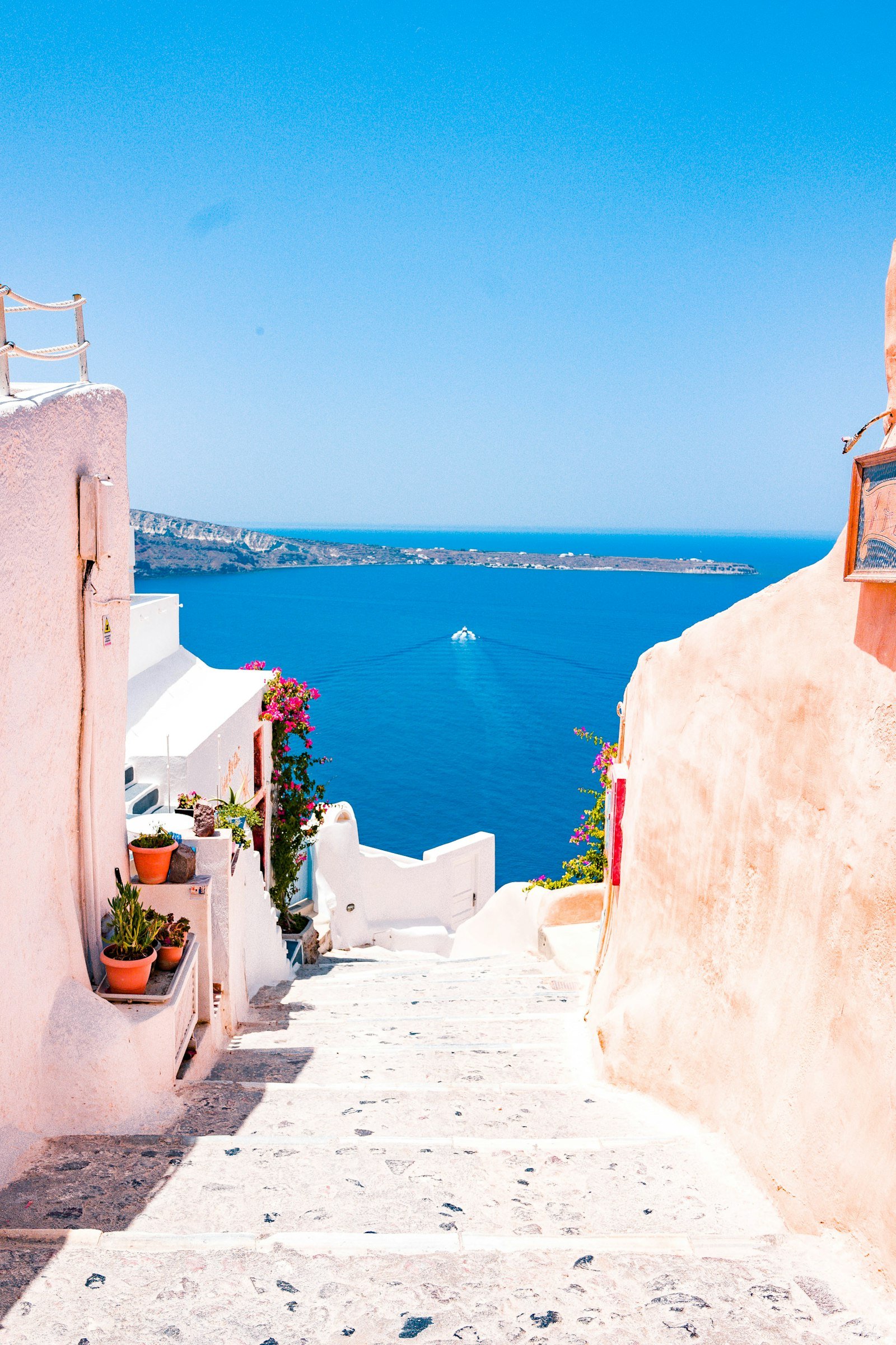 White and blue rooftops of Santorini at sunset